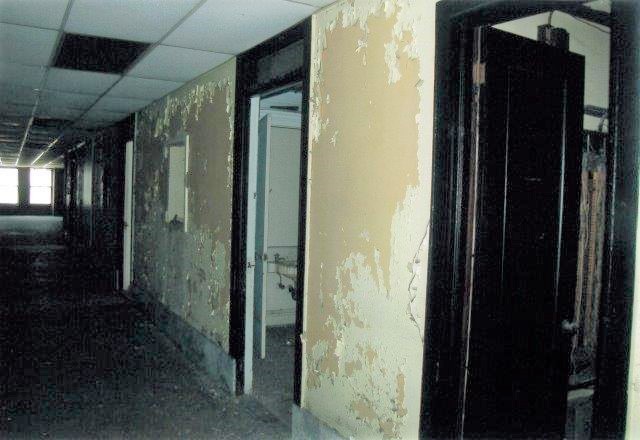 Before: view of residential corridor prior to rehabilitation